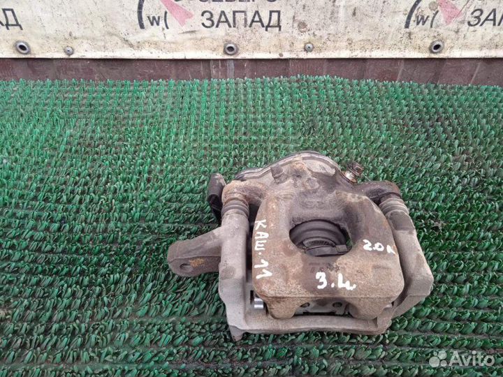 Суппорт задний левый Nissan Qashqai J11 MR20DD 2.0