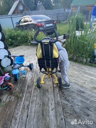 Трехколесный велосипед с ручкой