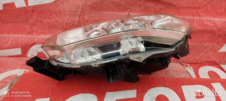 Фара левая Mitsubishi Pajero/Montero Sport