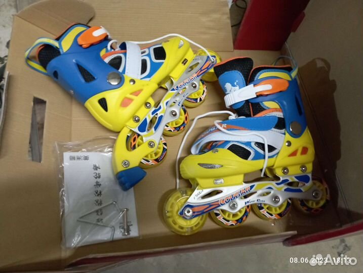 Роликовие коньки