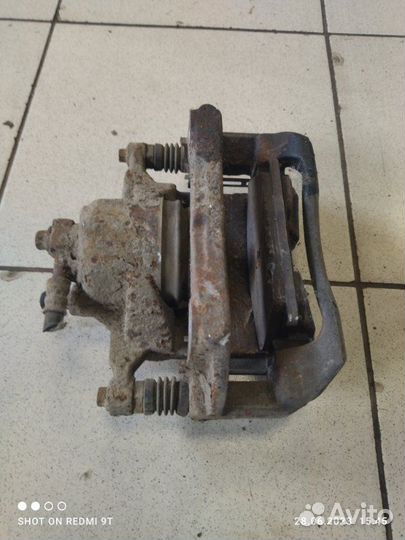 Суппорт тормозной передний левый Chevrolet Cruze