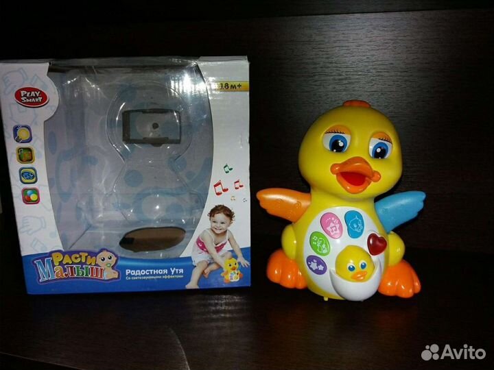 Заводной,интерактивный утенок