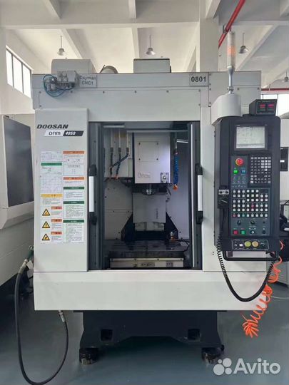 Фрезерный обрабатывающий центр doosan T4050