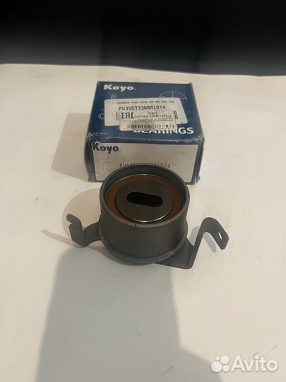 Ролик натяжителя ремня грм