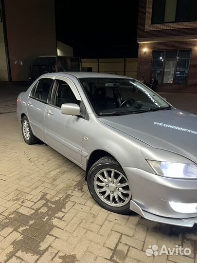 Mitsubishi Lancer 1.6 МТ, 2005, 316 300 км