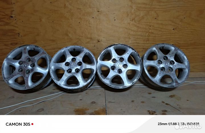 Литые диски Mazda r15