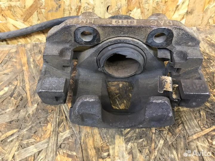 Суппорт тормозной передний левый Chevrolet Lanos