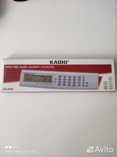 Kadio электр.калькулятор,календарь, часы,будильник