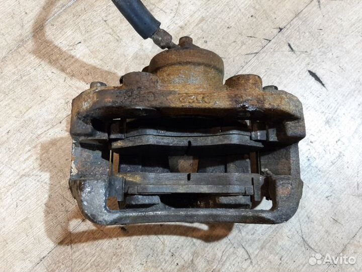 Суппорт передний левый Daewoo Nexia N150 1.6 2009