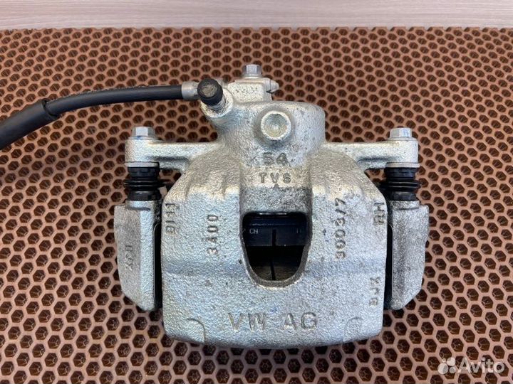 Суппорт тормозной передний правый Skoda Rapid