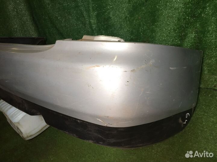 Бампер задний sedan Mazda Familia BHA Серебро с кр