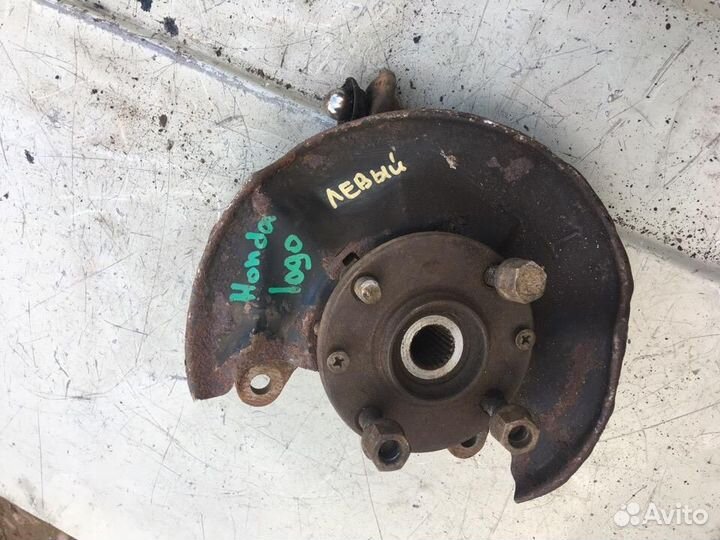 Кулак поворотный передний левый Хонда Лого