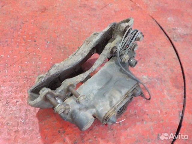 Суппорт задний левый Mercedes-Benz Axor 9444201202