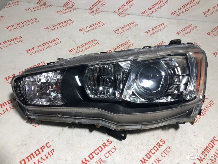 Фара ксеноновая левая Mitsubishi Lancer 10 седан