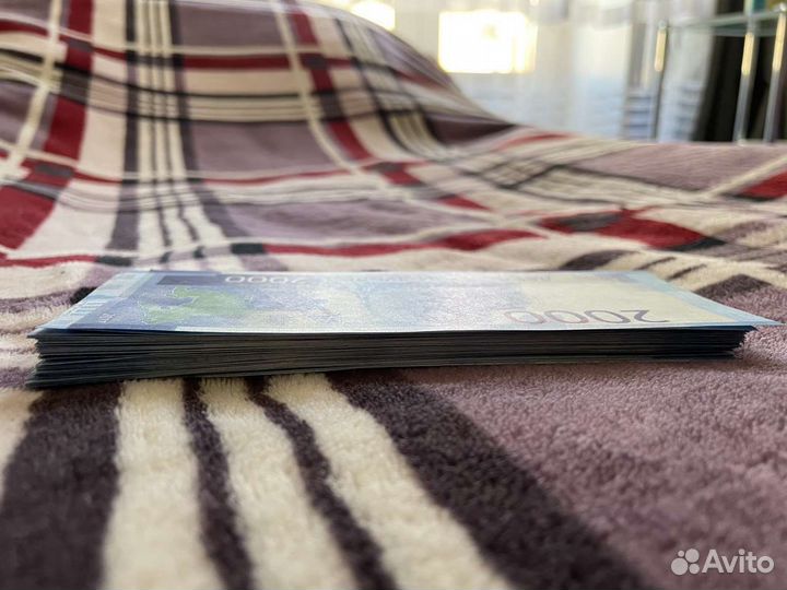 Пачка ненастоящих купюр(в пачке рубли)