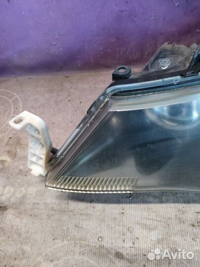 Фара ксеноновая передняя левая Mitsubishi