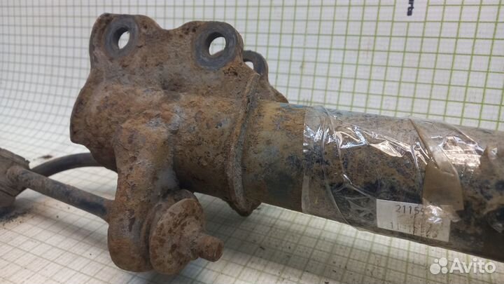 Амортизатор передний левый Nissan Sunny