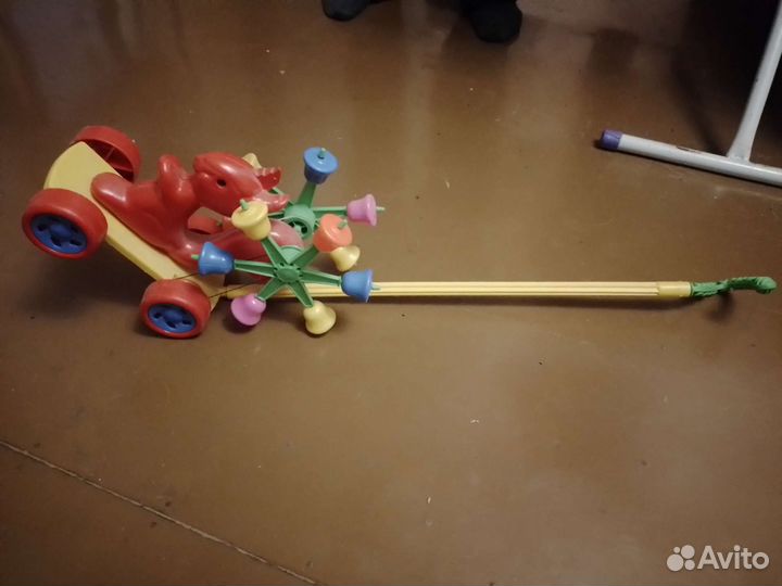 Юла, каталка на палке