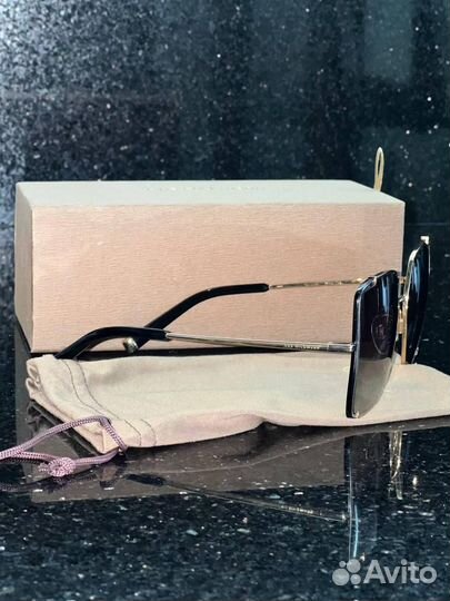 Солнцезащитные очки женские брендовые