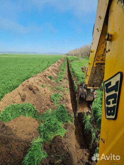 Услуги экскаватора погрузчика