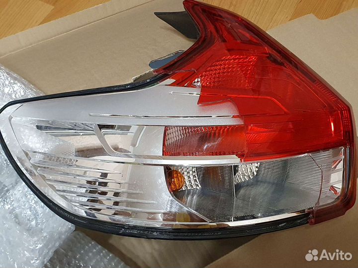 Фонарь задний левый