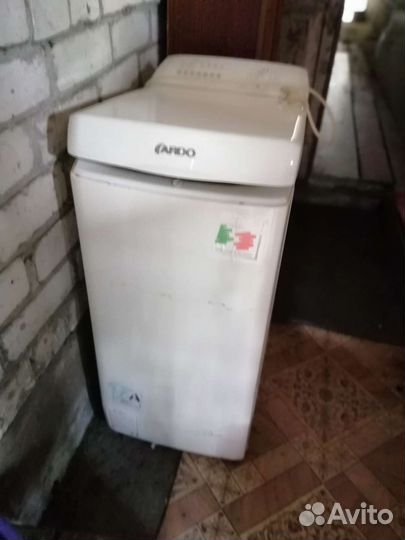 Стиральная машина с вертикальной загрузкой