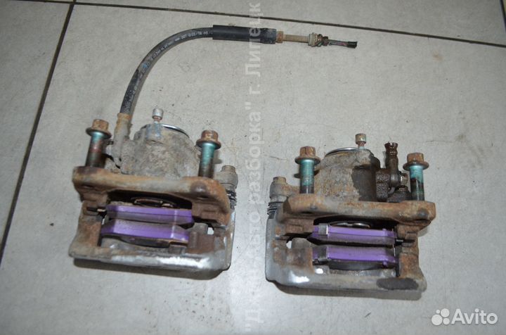 Суппорт тормозной задний левый правый Mazda 6 GJ