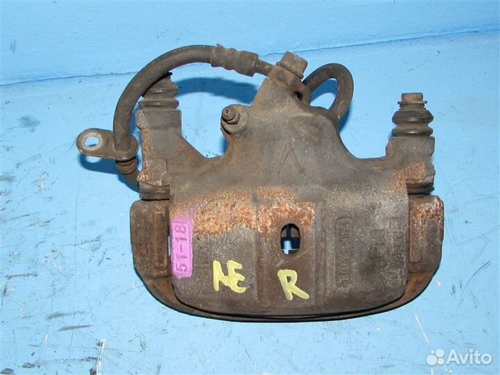 Суппорт передний правый Toyota Corolla AE100 4AFE