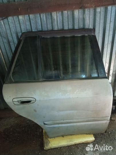 Двери Mazda Capella wagon