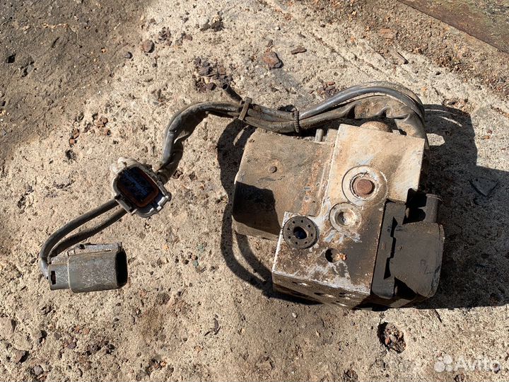 Блок (насос) ABS Nissan Almera N15