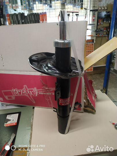 Амортизатор передний левый Nissan X-Trail T32