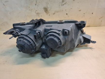 Фара передняя левая Saab 9-5