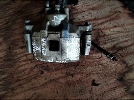 Суппорт перед правый Mitsubishi Lancer 10 X