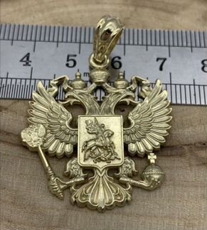 Герб России из золота