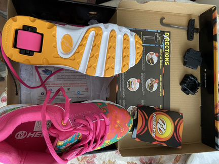 Новые роликовые кроссовки Heelys